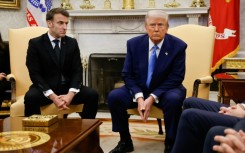 French President Emmanuel Macron said alongside Trump that he opposes the move
