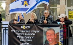 Mourners wait outside the morgue in Rishon LeZion in central Israel for the funeral procession of Ohad Yahalomi (pictured), one of the Israeli hostages taken captive by Palestinian militants in the October 2023 attacks