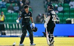 Rachin Ravindra (L) and Kane Williamson led New Zealand to an imposing 362-6 in their Champions Trophy semi-final against South Africa