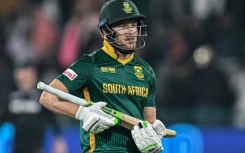 South Africa's David Miller celebrates scoring a century