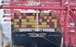 The US trade gap hit a new record in January, government data showed, as imports surged