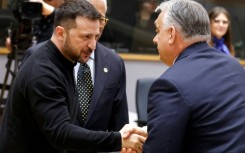 Hungary's Prime Minister Viktor Orban (R) regularly breaks EU unity on Ukraine