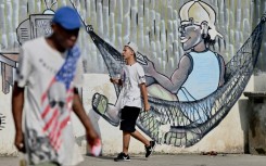 Fighting between rival factions of an Ecuadoran drug trafficking gang left at least 22 people dead in the port of Guayaquil on Thursday