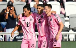 Tadeo Allende #21 of Inter Miami celebrates with teammates Luis Suárez #9 and Telasco Segovia #8 after scoring in the 1-0 win over Charlotte in MLS on Sunday.