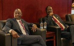 Kenyan President William Ruto (L) and opposition veteran Raila Odinga signed a deal to 'help ease the prevailing tension' in the country