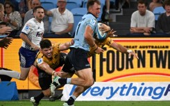 Waratah's Darby Lancaster makes a break during their Super Rugby Pacific match against the Western Force at the Allianz Stadium in Sydney