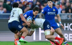 Italy's Ange Capuozzo (2nd L)