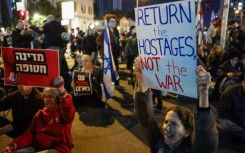 Family members and friends of Israeli hostages held in Gaza deamnd their government implement the ceasefire rather than restart the war 