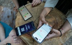 Activists demonstrate OlimpIA, a chatbot that helps victims of digital sexual violence