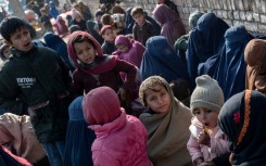 Thousands of Afghans in the process of being resettled in the United States are at risk of being sent home. This file photo shows Afghans deported from Pakistan in 2024