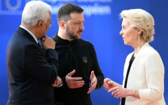 European Council President Antonio Costa, left, and European Commission President Ursula von der Leyen with Ukraine's President Volodymyr Zelensky at an EU summit