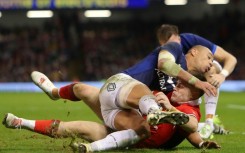 Positional switch: Joe Roberts (C) has been moved from centre to wing for Wales' Six Nations match against England in Cardiff 