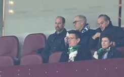 Royal approval: Britain's Prince William  (L) watches a Champions League match between Aston Villa and Celtic in January