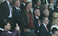 Manchester United's co-owner Jim Ratcliffe (centre) said he could walk away from the club if abuse towards him continues
