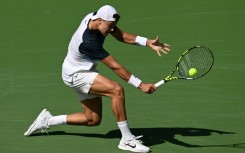 Denmark’s Holger Rune hits a backhand on the way to a semi-final victory over Russian Daniil Medvedev at Indian Wells
