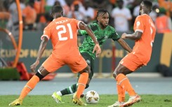 Nigeria star Ademola Lookman (C) takes on two Ivory Coast defenders during the 2024 Africa Cup of Nations final in Abidjan