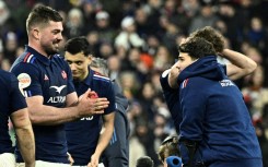 Gregory Alldritt (L) celebrates the Six Nations win with Antoine Dupont (R) 