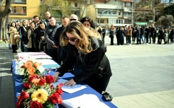 A crowd gathered to sign a book of condolences in Kocani on Monday