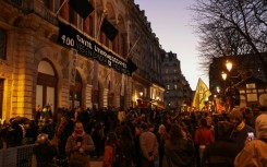 Police charged the historic building early Tuesday amid protests from pro-migrant activists