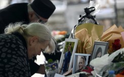 Mourners left flowers and messages for the 59 people killed in the fire in Kocani