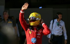Lewis Hamilton celebrates taking pole position after the sprint qualifying session