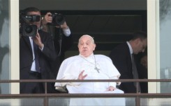 Pope says 'thank you, everyone' as greets faithful from hospital