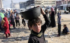 Damage following an Israeli strike in the southern Lebanese city of Tyre on March 22, 2025, during the most intense escalation since a ceasefire in the Israel-Hezbollah war