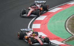 Ferrari's Lewis Hamilton (bottom) and Charles Leclerc were both disqualified from the Chinese Grand Prix on Sunday