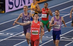 Norway's Jakob Ingebrigtsen celebrates after winning the men's 1500m final during the Indoor World Athletics Championships in Nanjing, China