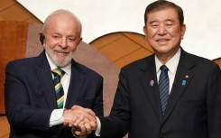 Brazilian President Luiz Inacio Lula da Silva (L) said his country and Japan had ' more to gain from integration than from protectionist practices'