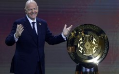 FIFA President Gianni Infantino with the Club World Cup Trophy during draw in December 2024