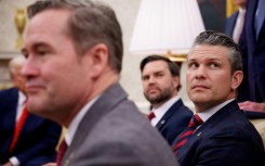 Top Trump administration officials including National Security Advisor Mike Waltz (L), Vice President JD Vance (C), and Defense Secretary Pete Hegseth (R) were all in the chat group