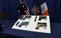 Confiscated 'ghost guns' displayed at a news conference in New York by city officials