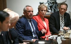 US Secretary of Health and Human Services Robert F. Kennedy Jr. (C) speaks as US President Donald Trump hosts (L) hosts a cabinet meeting in the Cabinet Room of the White House on March 24, 2025