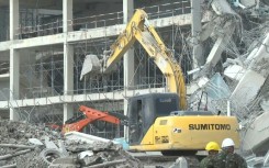 Rescuers search for survivors at Bangkok collapsed building site