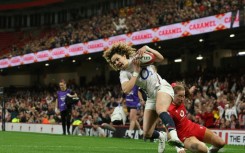 Try time: England full-back Ellie Kildunne scores one of her three tries in a Women's Six Nations win over Wales in Cardiff