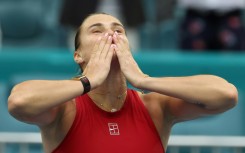 Aryna Sabalenka celebrates after defeating Jessica Pegula of the United States in the women's final of the Miami Open.