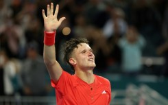 Czech teen Jakub Mensik celebrates after defeating Novak Djokovic of Serbia to win the Miami Open ATP Masters title