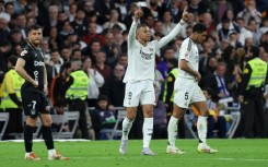 Real Madrid's French forward Kylian Mbappe (C) celebrates scoring his second goal against Leganes