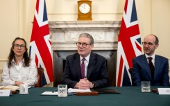 UK Prime Minister Keir Starmer, centre, with Sarah Simpkin from the Children's Society and writer Jack Thorne of the Netflix drama 'Adolescence'