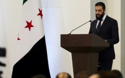 Syria's interim President Ahmed al-Sharaa delivers a speech in Damascus on March 29, 2025