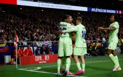 Barcelona's Spanish forward Ferran Torres (2L) celebrates scoring against Atletico Madrid in the Copa del Rey semi