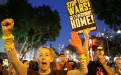 Israelis rally in Tel Aviv to pressure their government to end the war and secure the release of hostages