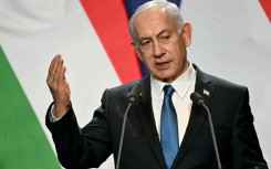 Israeli Prime Minister Benjamin Netanyahu comes to Washington direct from a visit to Hungary