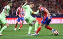 Barcelona's Dutch midfielder Frenkie De Jong (C) has found his footing after a few tricky years at the club