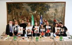 Relatives of Israeli hostages, including Tamir Nimrodi, give a press conference on April 8, 2024 in Rome