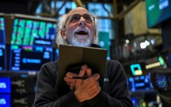 A trader works on the floor of the New York Stock Exchange (NYSE) during afternoon trading on April 9, 2025 in New York