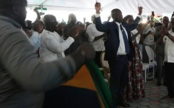 Supporters of Brice Oligui Nguema erupt with joy at his election campaign headquarters