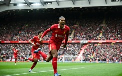 Liverpool defender Virgil van Dijk celebrates scoring against West Ham