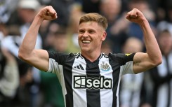 Newcastle's Harvey Barnes celebrates scoring against Manchester United